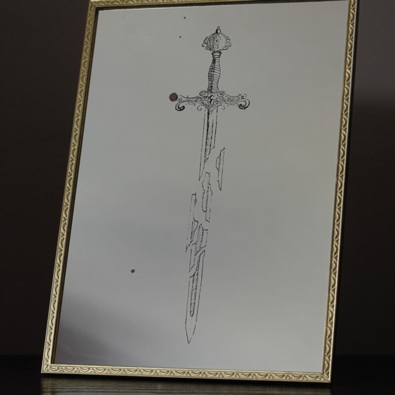 Lustro z Grawerem Pękniętego miecza