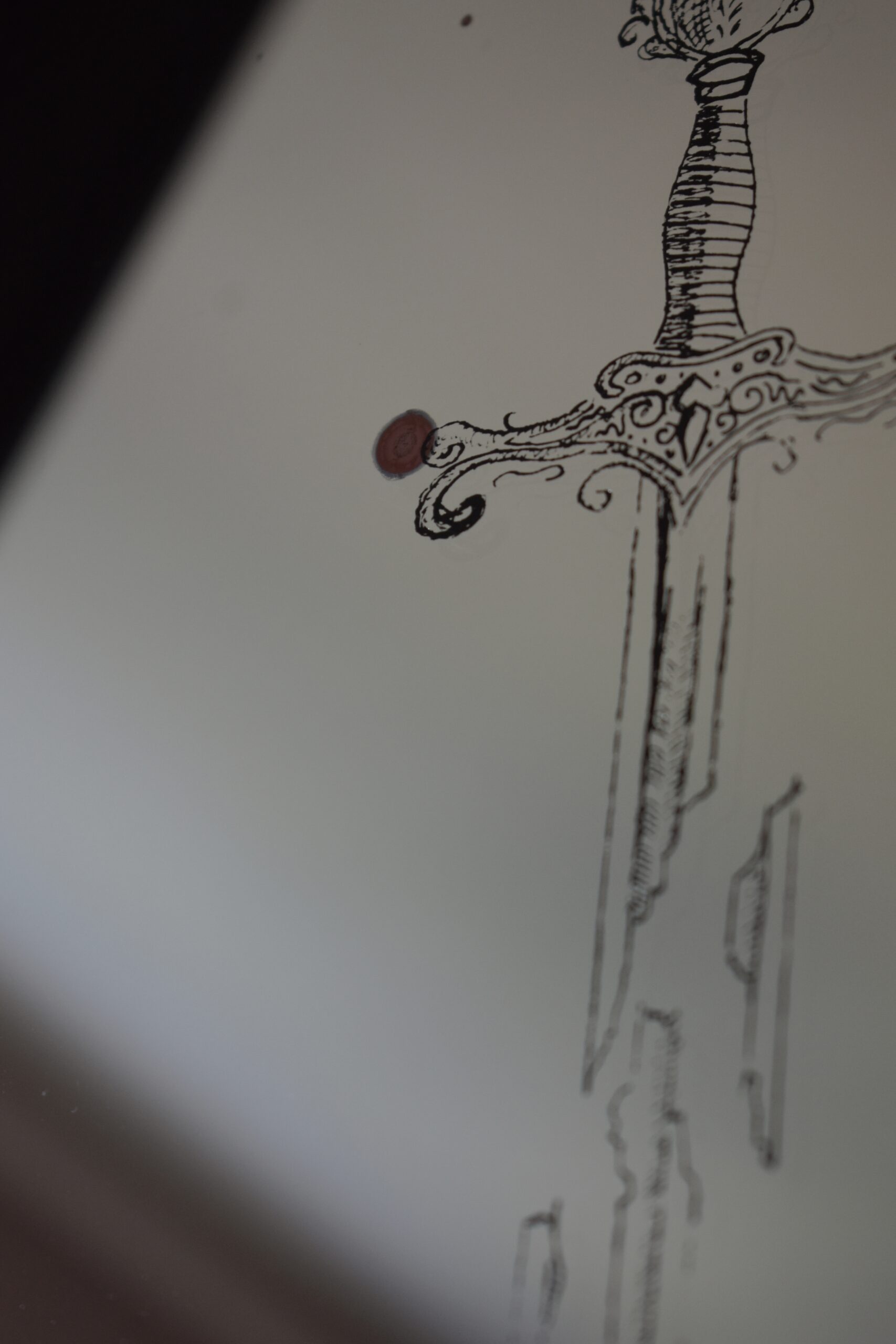 Lustro z Grawerem Pękniętego miecza